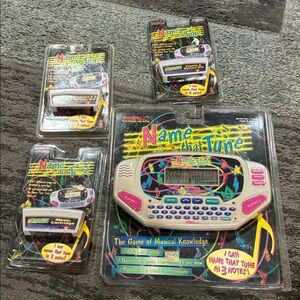 Name That Tune Handheld Game - White/Pink 1997